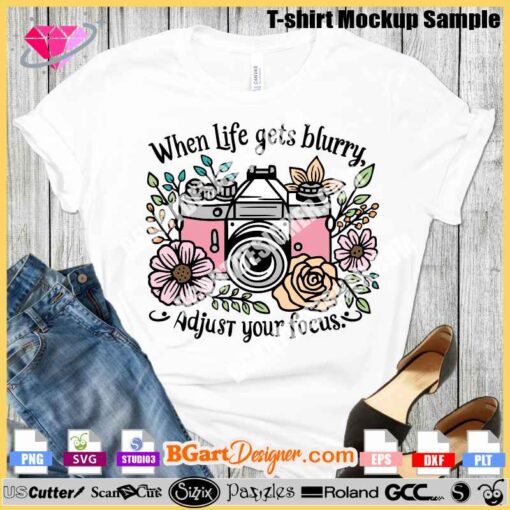 Instant digital download of layered vector design 'When Life Gets Blurry Adjust Your Focus' for cutting machines like Cricut and Silhouette. Perfect for t-shirts and DIY craft projects. Includes SVG, PNG, DXF, EPS files for complete customization. Camera with flowers design. Optimize your search with keywords: layered vector design, cutting machines, DIY projects, instant download!