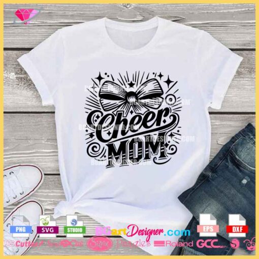 Cheer Mom SVG design on a white T-shirt with a bold bow and sparkling star accents, perfect for crafting and cheerleading supporters.