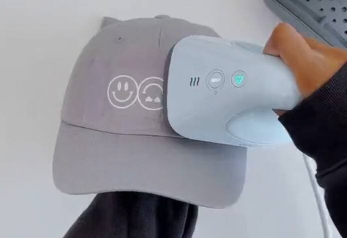 pressing a hat using the cricut hat press