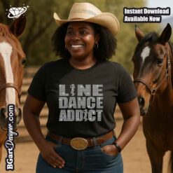 Line dance rhinestone design displayed on black shirt featuring cowgirl dancer silhouette for country western apparel
